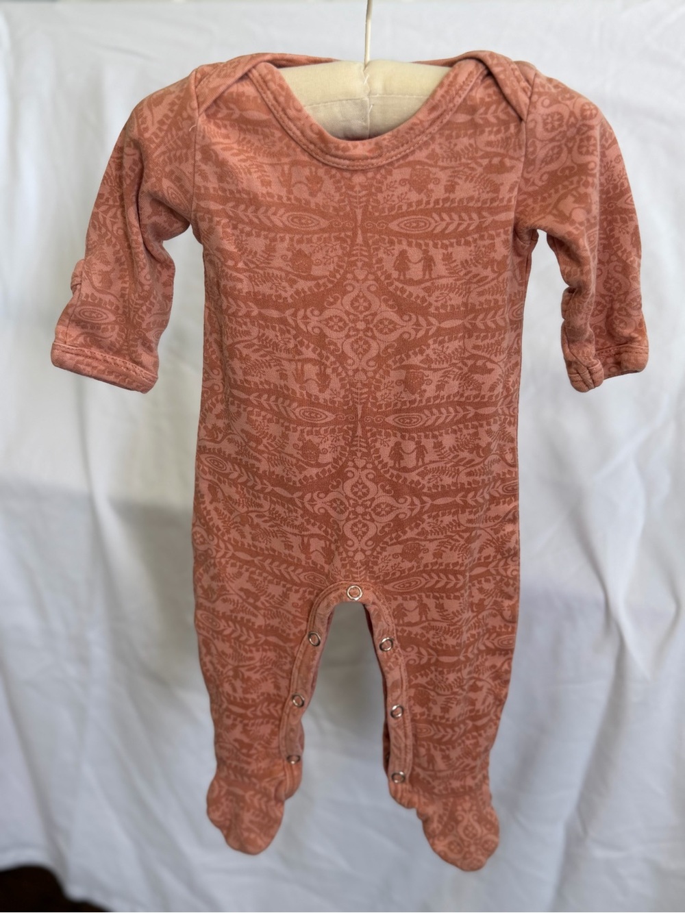 Kate Quinn Baby One-Piece Footed sleeper in Terracotta Print